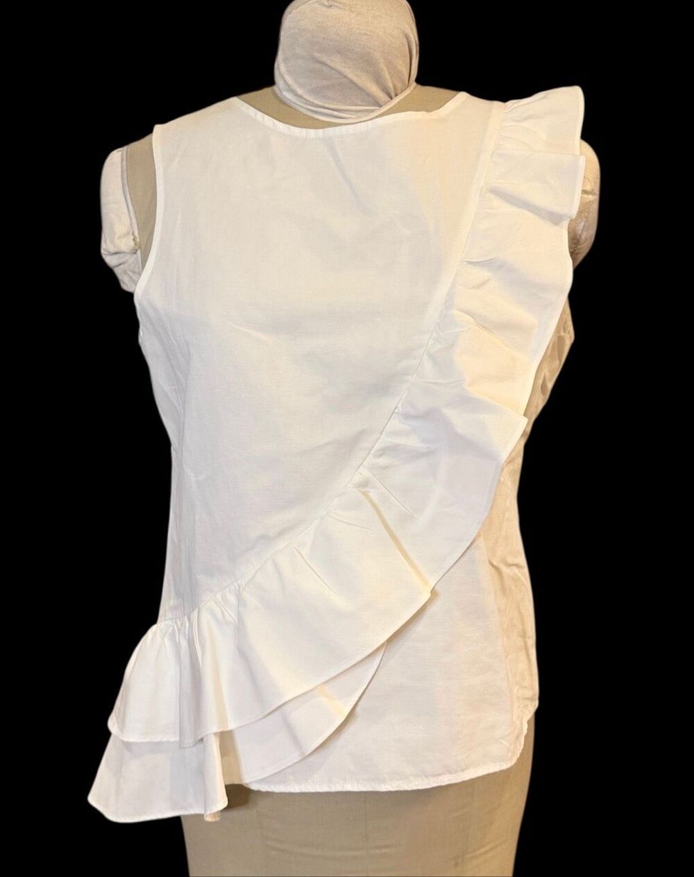 Tyler Boe asymmetrical ruffle sleeveless top crafted from a lightweight linen bl